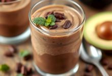 Creamy healthy chocolate avocado mousse in glass