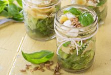 Fresh mason jar salad with layers of vegetables