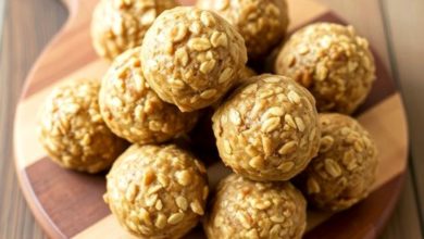 Peanut butter oat energy balls on a wooden board
