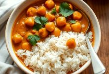 Creamy vegan chickpea curry in a bowl with rice
